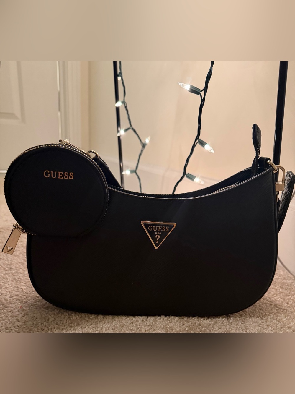 GUESS Black Crescent Shoulder Bag with Gold-tone Logo Accent